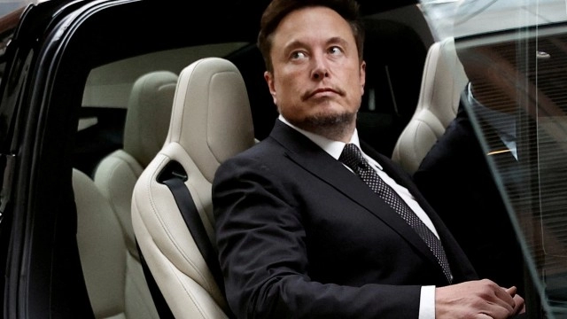 Analysis: Elon Musk and Tesla loom over Detroit's auto labor talks