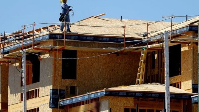 Lumber prices have slumped as mortgage rates cool housing demand, but the commodity may bounce back up by 13% on tight supply, 2 experts say