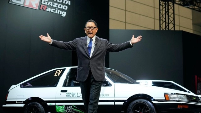 Toyota says it plans to transform older cars into eco-friendly models to reduce carbon emissions, as the carmaker faces increased criticism for EV hesitancy