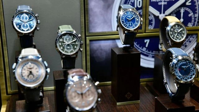 Shares of watch makers and retailers advance as buoyant sales confound luxury pessimists