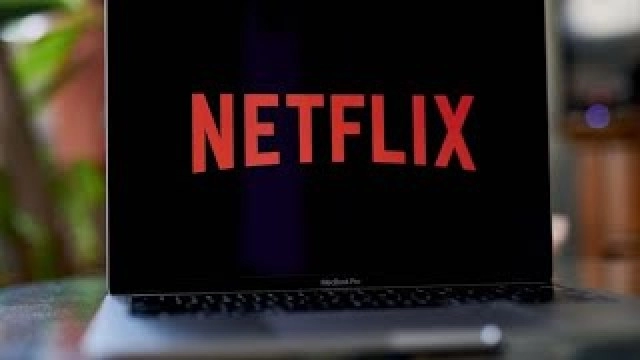 Netflix Jumps, Sees Return to Growth