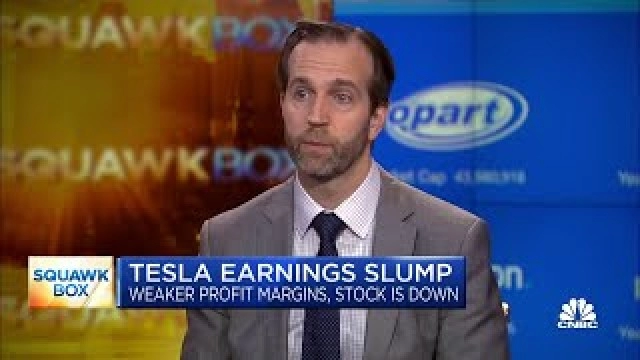 The near-term is quite challenging for Tesla, says Wells Fargo's Colin Langan